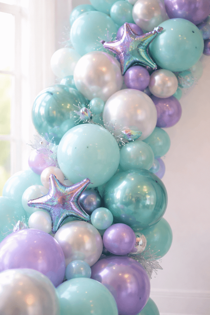 mermaid balloon garland in aqua teal and pearl tones